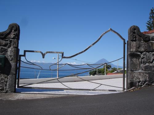 Whale tail gate at the house in Manadas